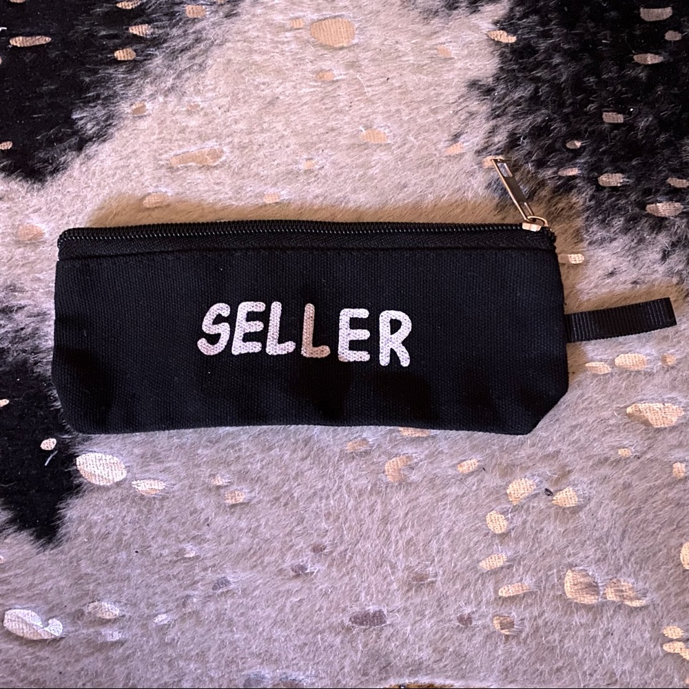 Black Canvas Zipper Pouch with “Seller” Graphic On One Side